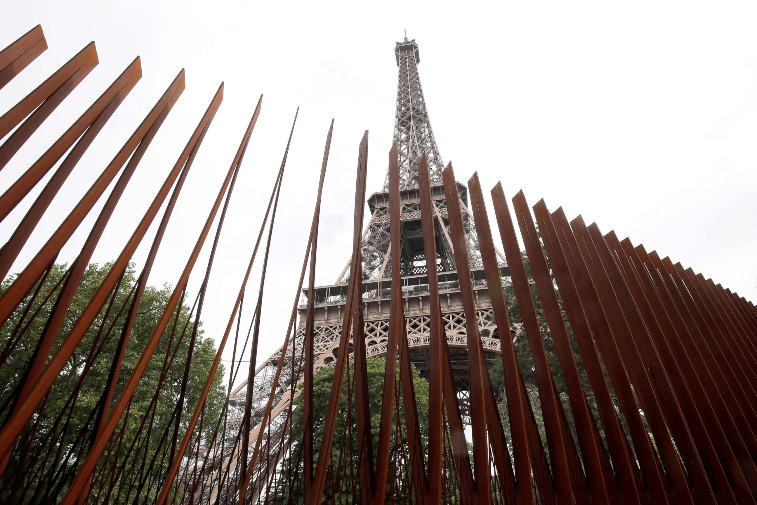 PHOTO: A security steel fence is pictured around the Eiffel Tower in Paris, June 14, 2018.