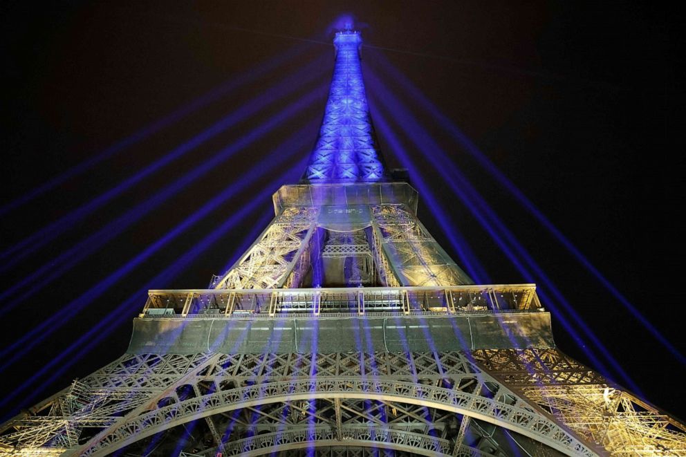 PHOTO: This photograph taken on Feb. 23, 2023, shows the Eiffel Tower lit in the colors of the Ukrainian flag in a show of support to Ukraine, one year after Russia launched a military invasion on the country, in Paris.