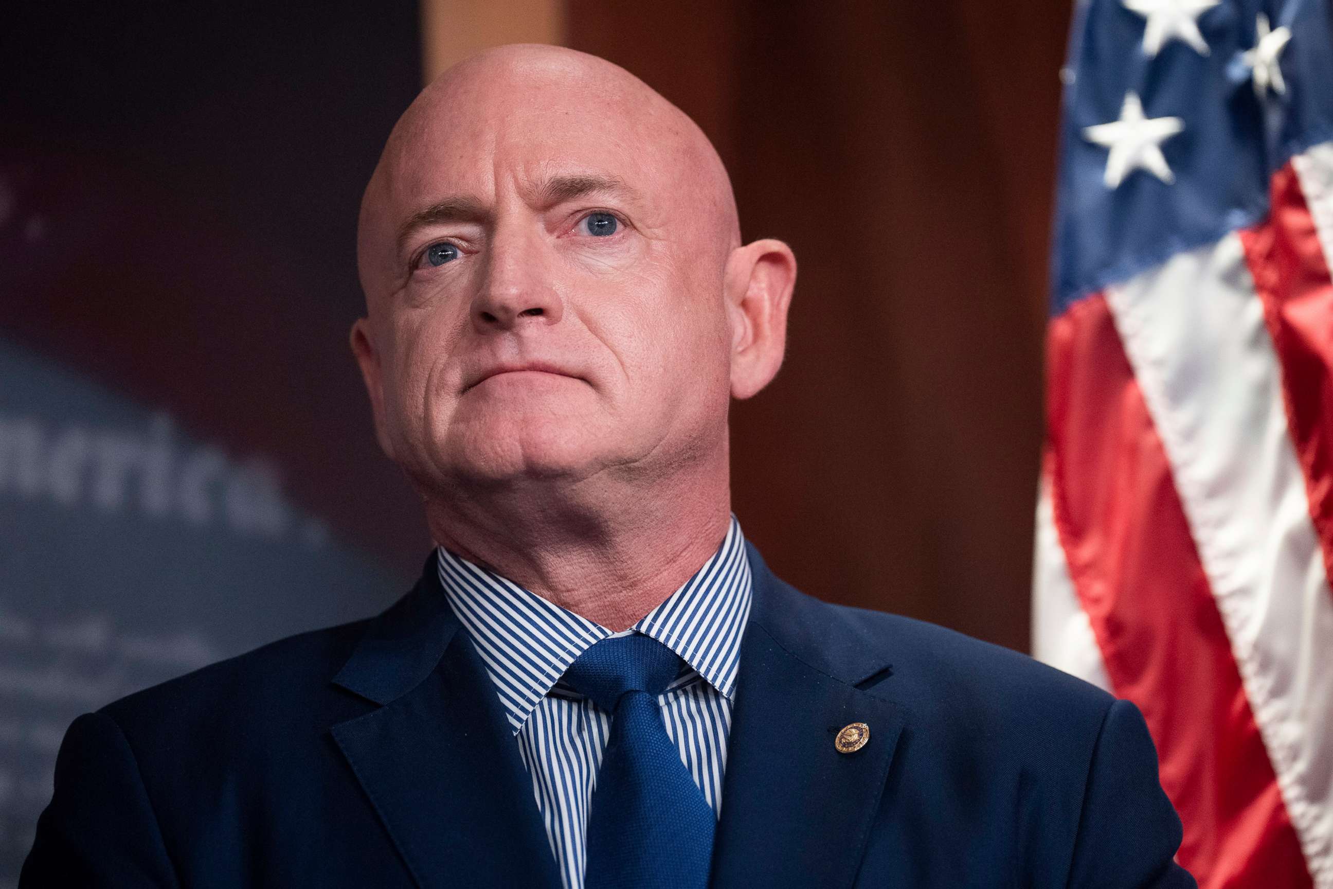 PHOTO: Sen. Mark Kelly participates in the news conference after the Senate Democrats' weekly lunch in the Capitol, July 26, 2022.