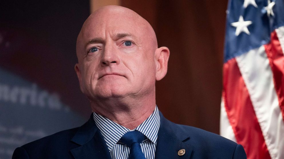 PHOTO: Sen. Mark Kelly participates in the news conference after the Senate Democrats' weekly lunch in the Capitol, July 26, 2022.