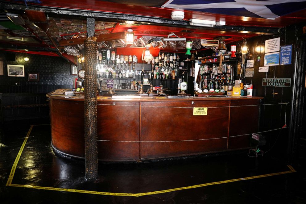 PHOTO: An electric fence installed at the bar area of The Star Inn, to ensure customers are socially distanced from staff while ordering drinks, following the outbreak of the coronavirus disease (COVID-19), in Cornwall, Britain July 14, 2020.