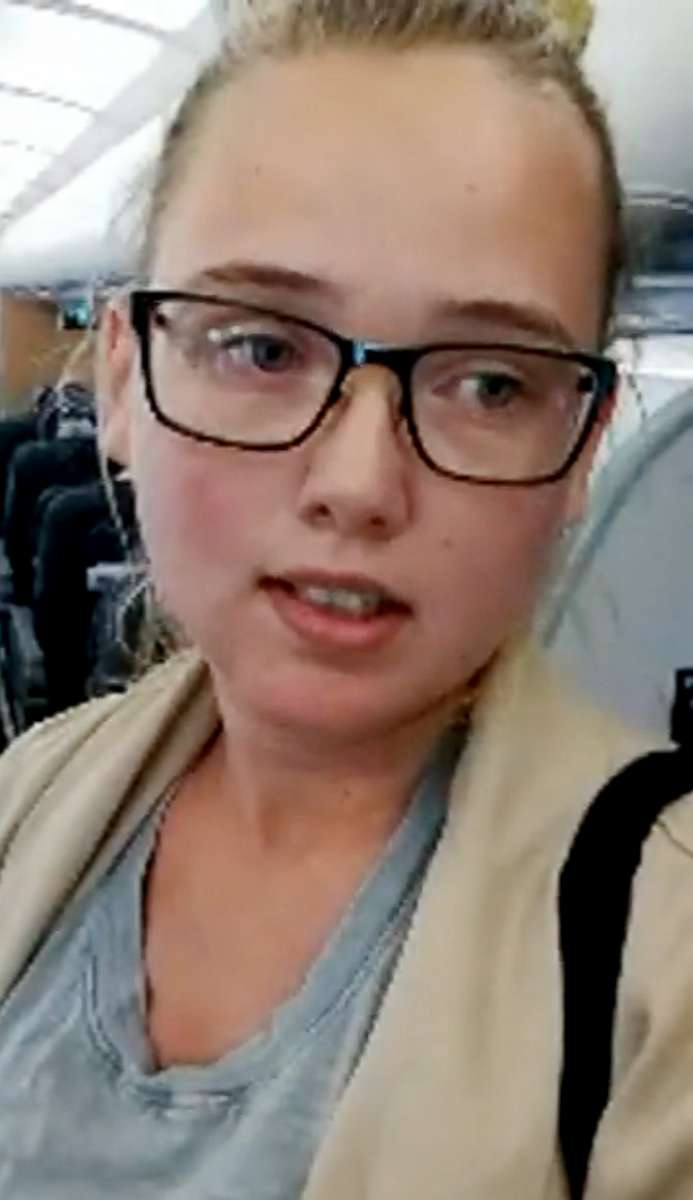 PHOTO: Swedish activist Elin Ersson, seen in an image from a video she posted on July 23, 2018, disrupted the deportation of an Afghan man from Sweden by refusing to sit down on a plane in the Swedish city of Gothenburg.
