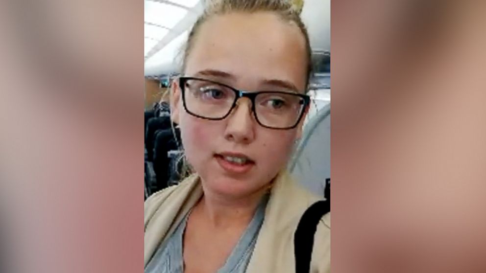 PHOTO: Swedish activist Elin Ersson, seen in an image from a video she posted on July 23, 2018, disrupted the deportation of an Afghan man from Sweden by refusing to sit down on a plane in the Swedish city of Gothenburg.