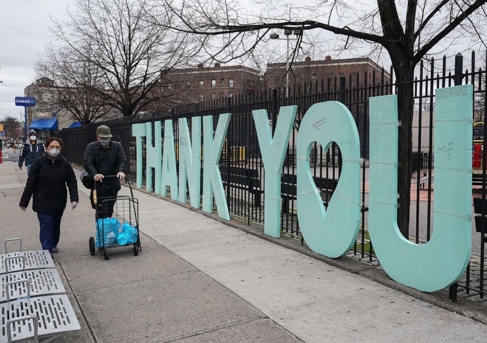 PHOTO: A "Thank You" sign for first responders decorates a fence across the street from Elmhurst Hospital in the Borough of Queens, New York, March 31, 2020.