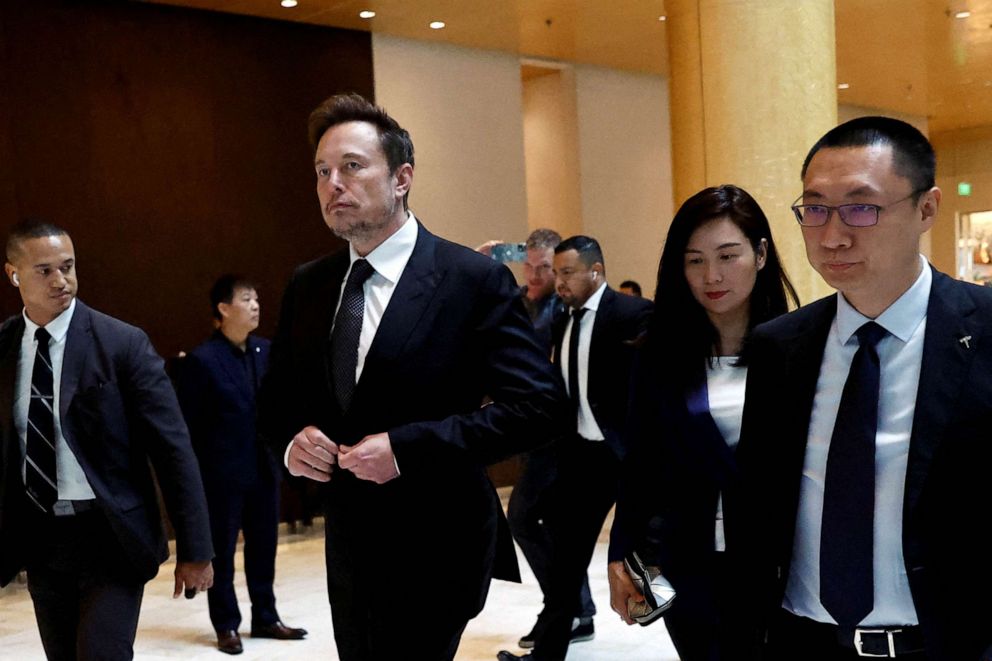PHOTO: Tesla CEO Elon Musk leaves a hotel in Beijing on May 31, 2023.