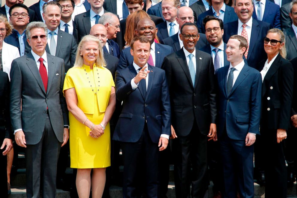 PHOTO: President Emmanuel Macron poses with Rwanda's President Paul Kagame (3rdR), Facebook's CEO Mark Zuckerberg (2ndR) and IMB's President and CEO Ginni Rometty (2ndL) as he hosts the Tech for Good summit at the Elysee Palace in Paris, on May 23, 2018.