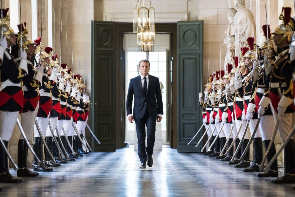 PHOTO: French President Emmanuel Macron walks through the Galerie des Bustes to access the Versailles Palace's hemicycle for a special congress gathering both houses of parliament in the palace of Versailles, outside Paris, July 9, 2018.