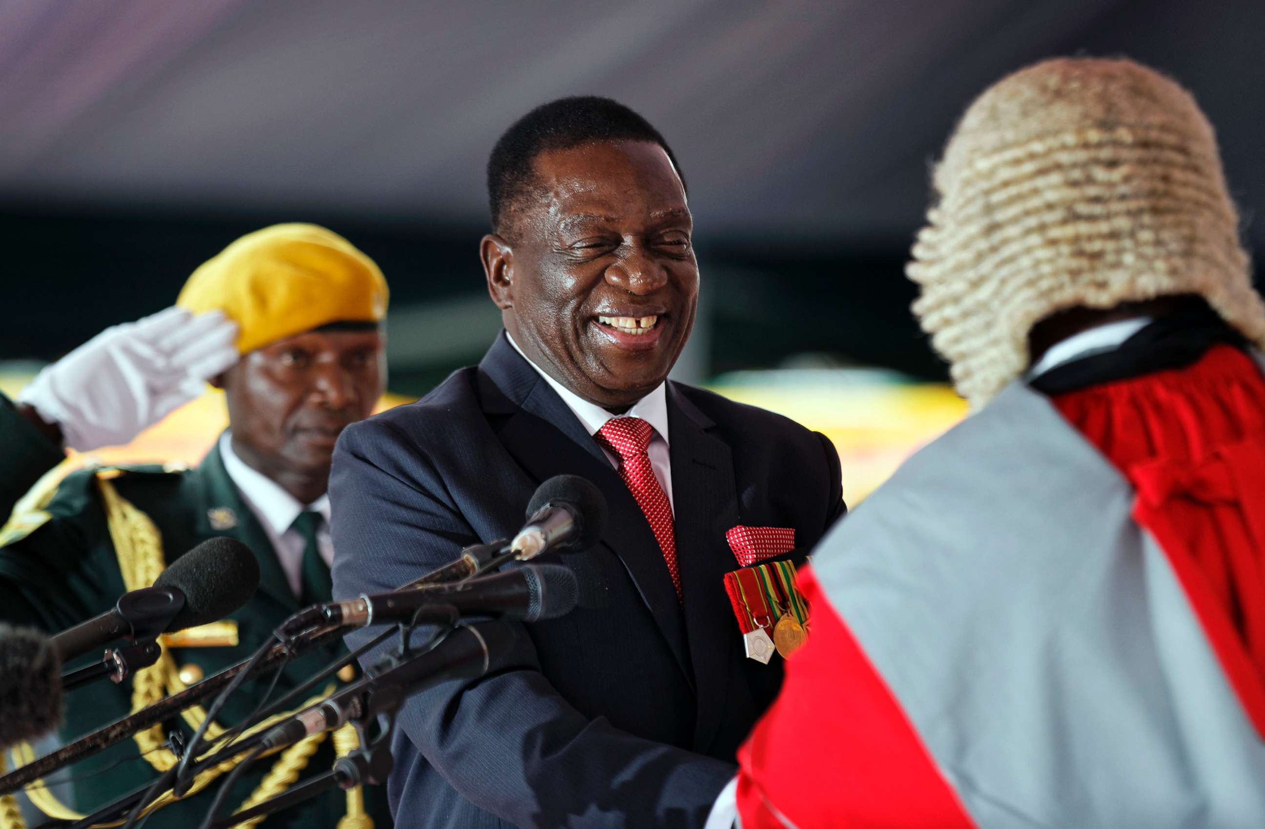 PHOTO: Emmerson Mnangagwa, center, is sworn in as President at the presidential inauguration ceremony in the capital Harare, Zimbabwe, Nov. 24, 2017 