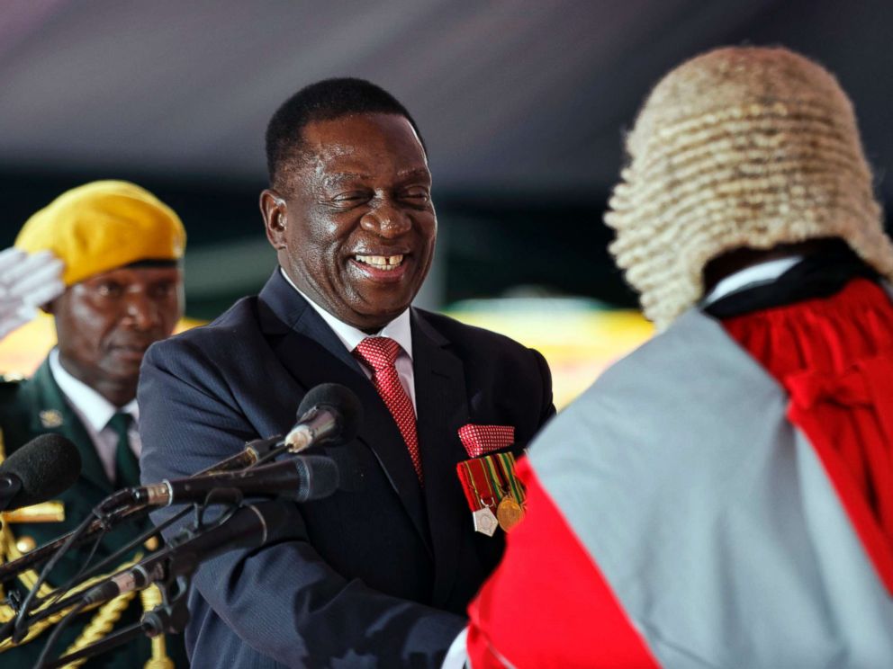 PHOTO: Emmerson Mnangagwa, center, is sworn in as President at the presidential inauguration ceremony in the capital Harare, Zimbabwe, Nov. 24, 2017
