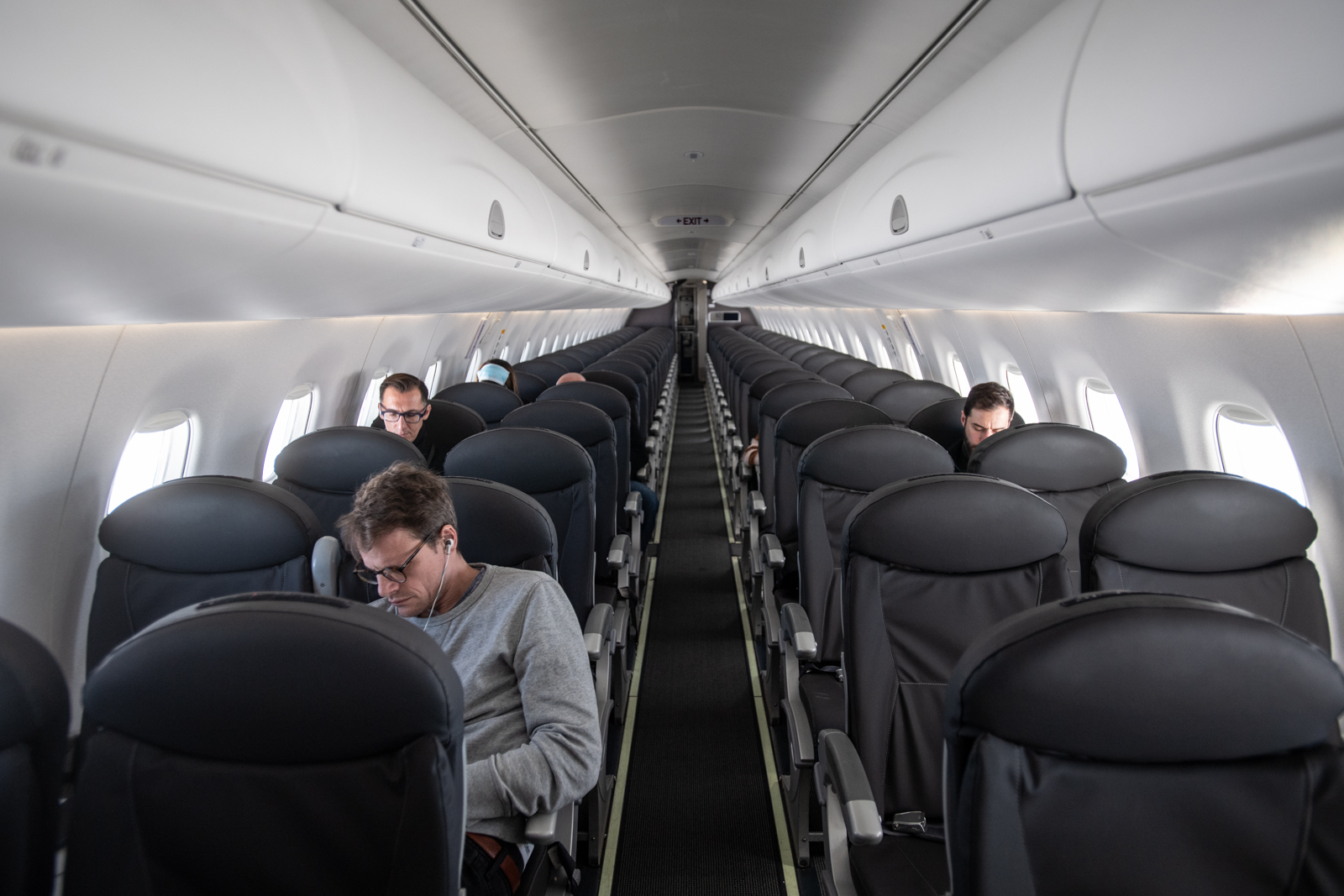 PHOTO: An almost empty British Airways passenger plane flies from Milan to London on March 5, 2020.