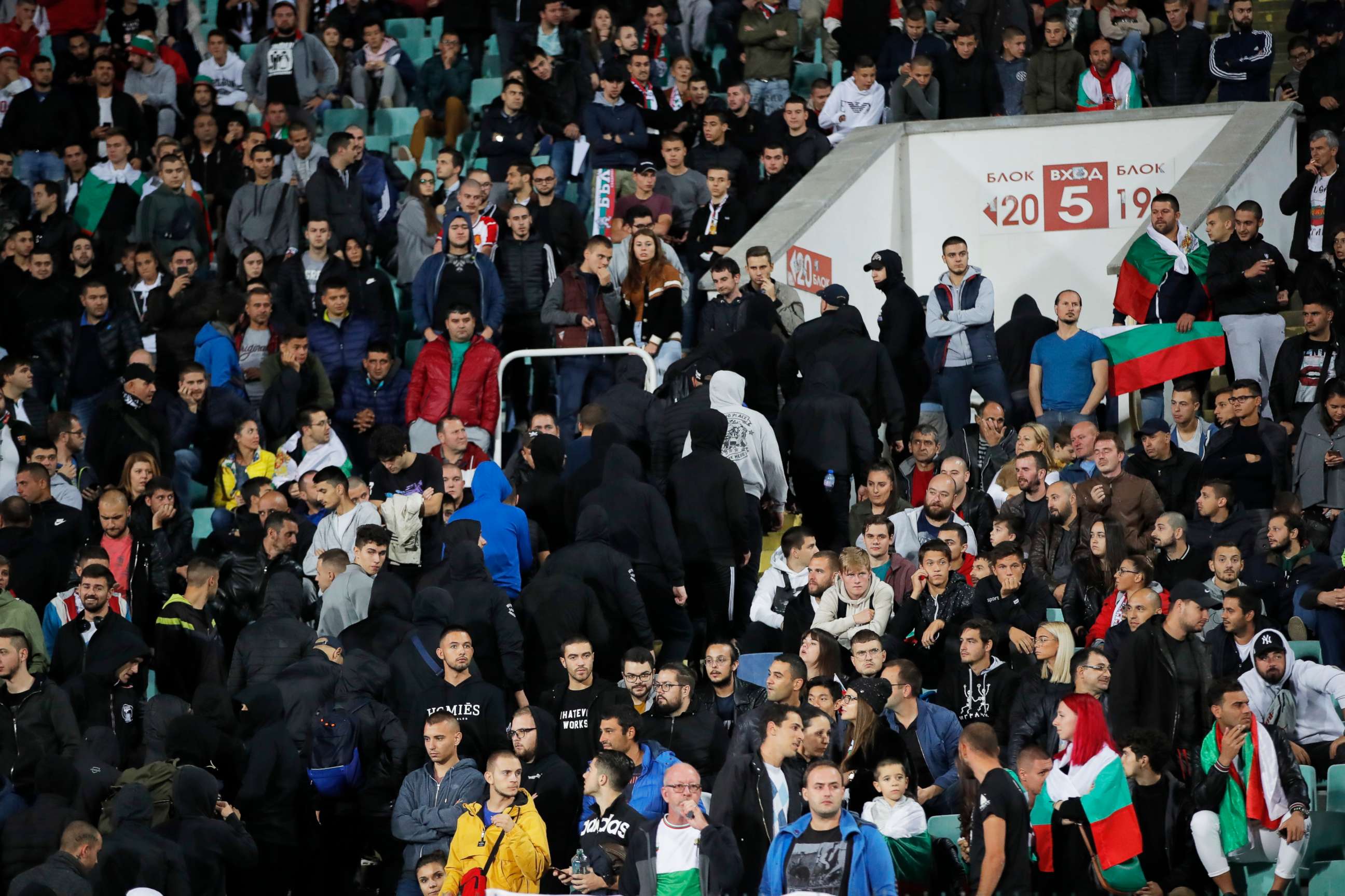 PHOTO: Bulgarian fans leave the stadium during the Euro 2020 group A qualifying soccer match between Bulgaria and England, at the Vasil Levski national stadium, in Sofia, Bulgaria, Oct. 14, 2019. 