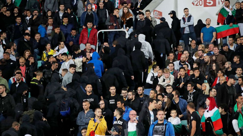 Bulgarian fans leave the stadium during the Euro 2020 group A qualifying soccer match between Bulgaria and England, at the Vasil Levski national stadium, in Sofia, Bulgaria, Oct. 14, 2019. Bulgaria has been punished for the Nazi salutes and racist chanting of its soccer fans with an order to play a European Championship qualifying game in an empty stadium, although the team avoided expulsion from the competition. B