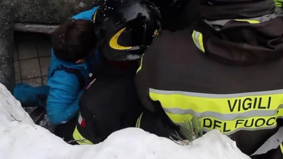 PHOTO: A handout picture made available by the Italian Fire Department shows emergency workers rescuing guests at the hotel Rigopiano, Jan. 20, 2017, which was hit by a massive avalanche in central Italy. 