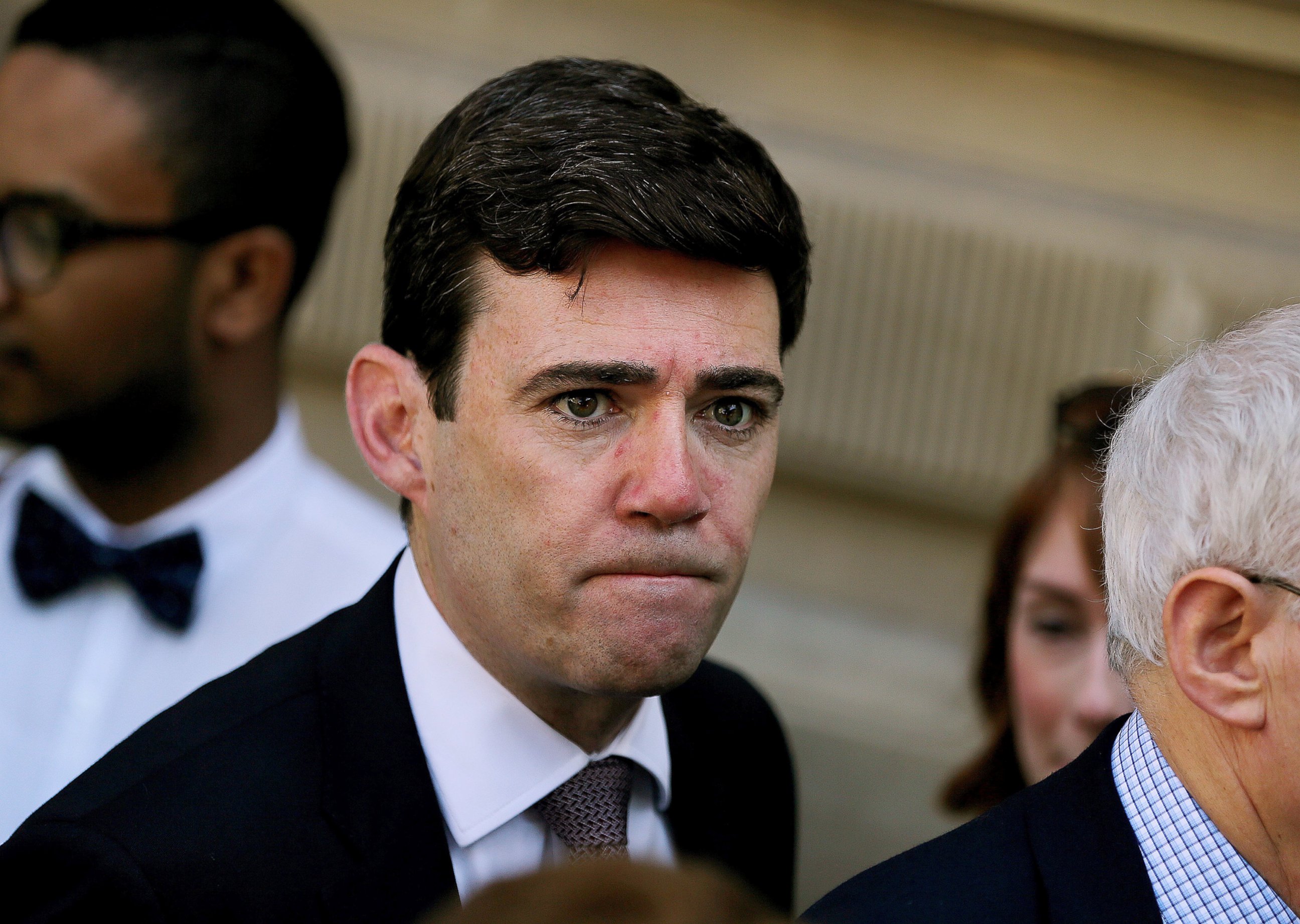 PHOTO: Mayor of Manchester Andy Burnham arrives to pay his respects for the victims of the Manchester bombing, at St Ann's Square in Manchester, England, May 25, 2017. 