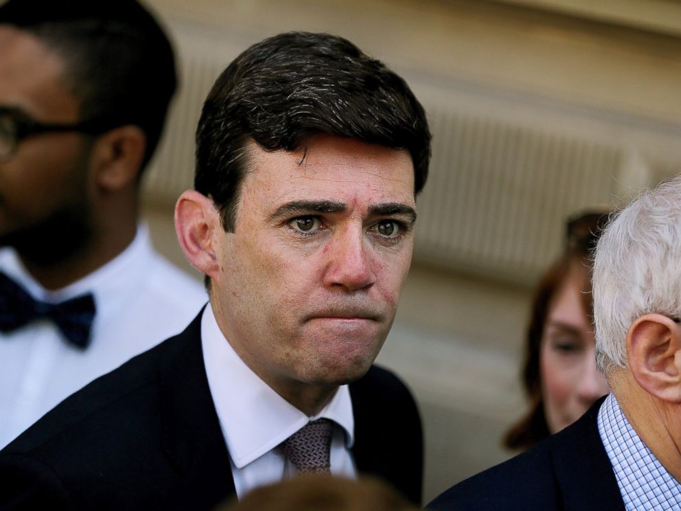 PHOTO: Mayor of Manchester Andy Burnham arrives to pay his respects for the victims of the Manchester bombing, at St Anns Square in Manchester, England, May 25, 2017.