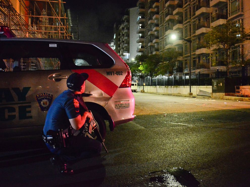 PHOTO: A Filipino policeman takes position outside the Resort World Manila hotel in Pasay City, Philippines, June 2, 2017.