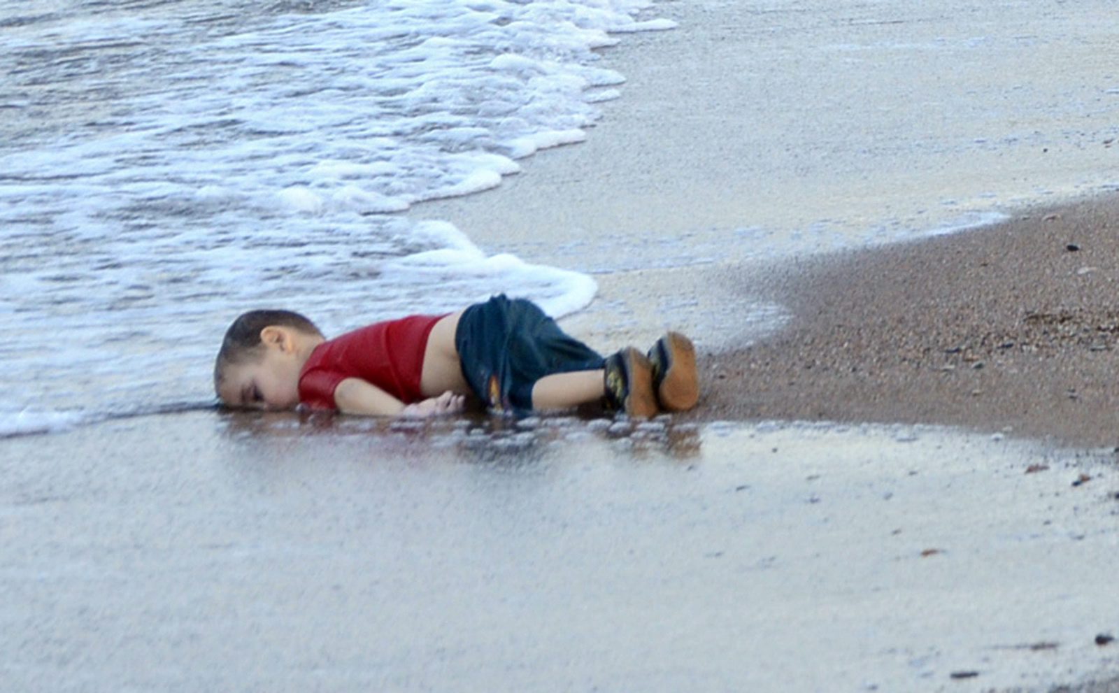 PHOTO: The body of of three-year-old Syrian refugee boy Aylan Kurdi is seen washed up on the shore in the coastal town of Bodrum, Mugla city, Turkey on Sept. 2, 2015.