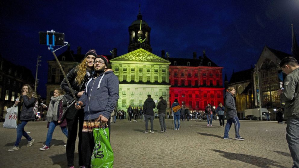 PHOTO: The Royal Palace at Dam Square in Amsterdam is projected with the colors of the Belgian flag in tribute to the victims of the Brussels terror attacks that occured earlier in the day, Amsterdam, the Netherlands, March 22, 2016. 
