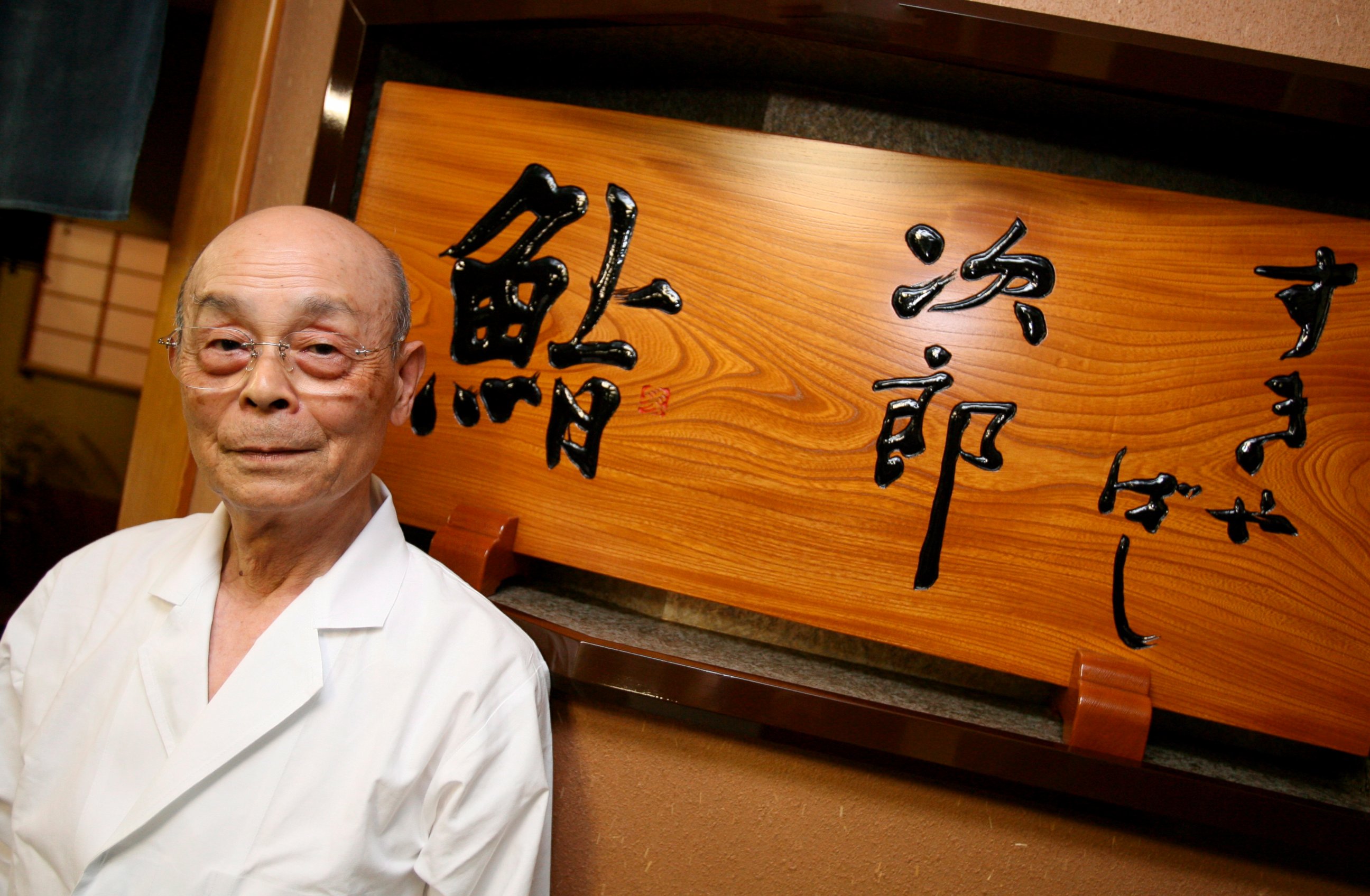 PHOTO: Jiro Ono, master sushi chief, stands in front of his sushi restaurant, Sukiyabashi Jiro, in Tokyo, Japan, in this Nov. 19, 2007 file photo. 