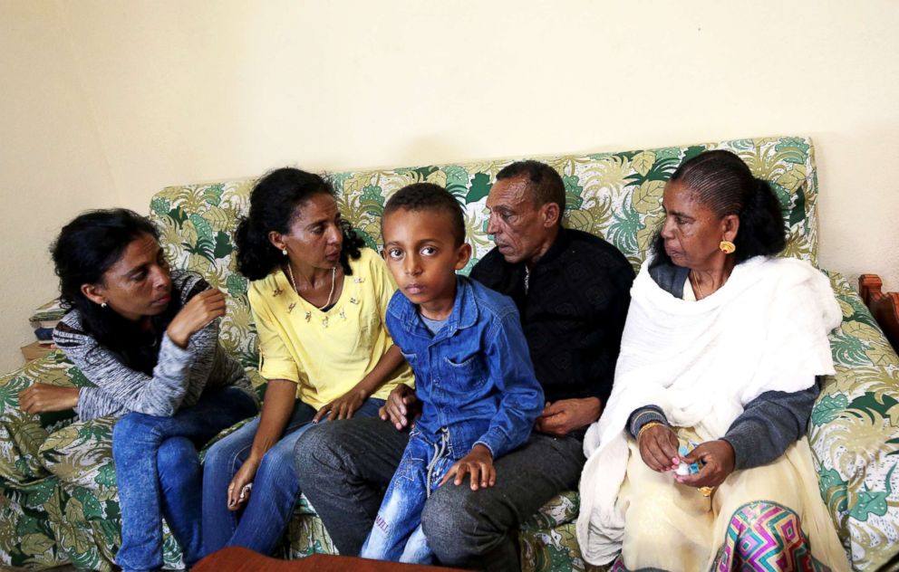 PHOTO: Addisalem Hadgu,  meets his immediate family members for the first time in eighteen years, in Asmara, Eritrea, July 19, 2018.