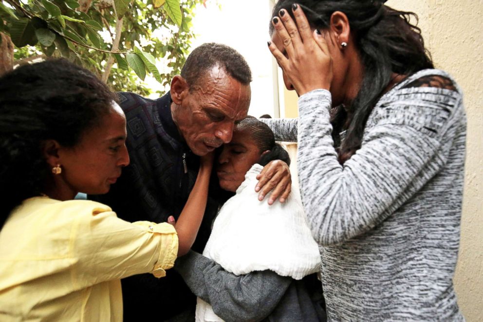 PHOTO: Addisalem Hadgu, 58, meets his wife, Nitslal Abraha, 58, and his daughters in Asmara, Eritrea, July 19, 2018.