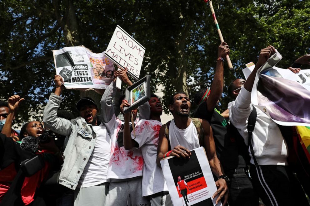 PHOTO: People gather to protest against the treatment of the ethnic Oromo group in Ethiopia, outside Downing Street in London, July 3, 2020.