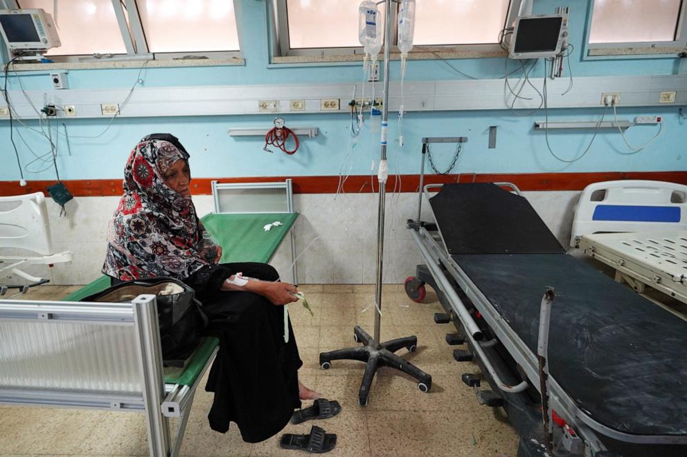 PHOTO: A Palestinian woman receives medical care at the European hospital in Khan Younis in the southern Gaza Strip on May 17, 2024, amid the ongoing conflict in the Palestinian territory between Israel and the militant group Hamas.