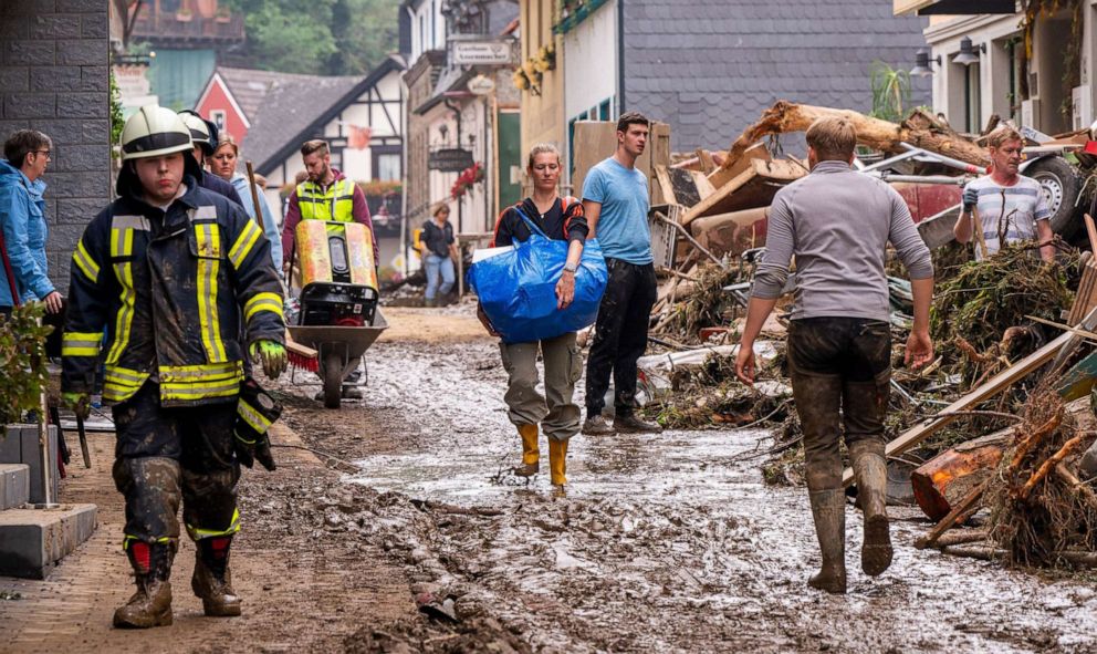 PHOTO: Helpers are seen during clearing work in Altenahr, western Germany, July 17, 2021.