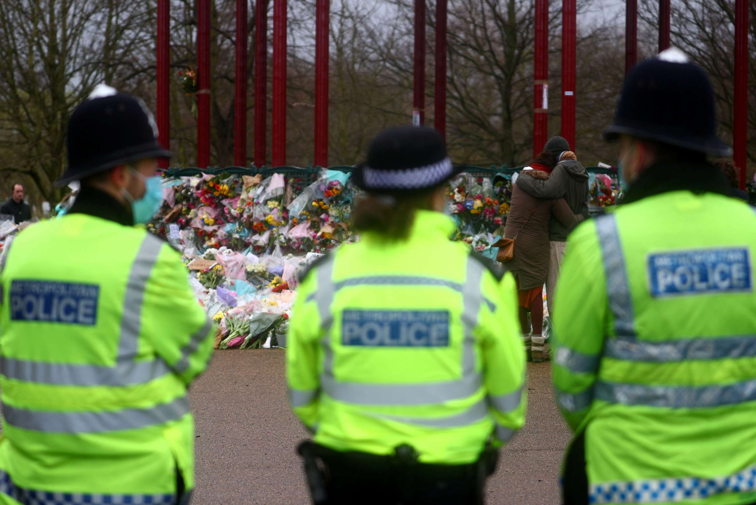 PHOTO: Police officers stand guard at a memorial site at Clapham Common Bandstand, following the kidnap and murder of Sarah Everard, in London, Britain March 15, 2021.