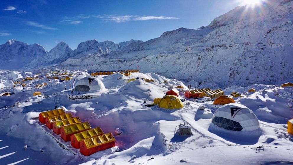 PHOTO: Climbers at Mount Everest base camp weigh the decision to continue their challenge amid growing reports of COVID-19 cases there.