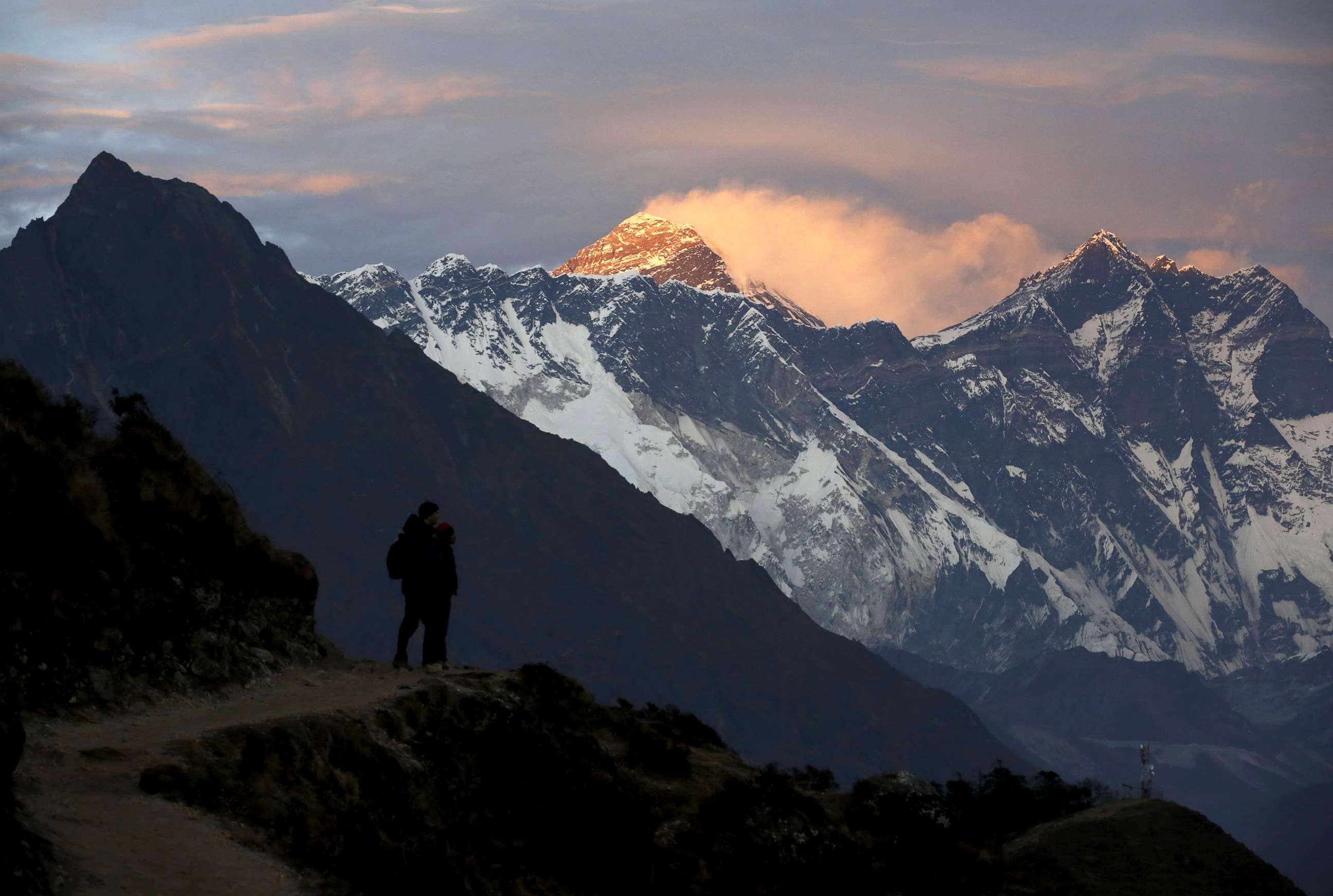 PHOTO: Light illuminates Mount Everest during sunset in Solukhumbu district, also known as the Everest region, Nov.30, 2015.