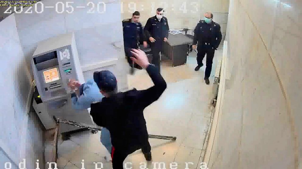 PHOTO: A guard appears to strike a prisoner, at Evin prison in Tehran, Iran, in an undated image taken from video shared by a self-identified hacker group called "The Justice of Ali." 