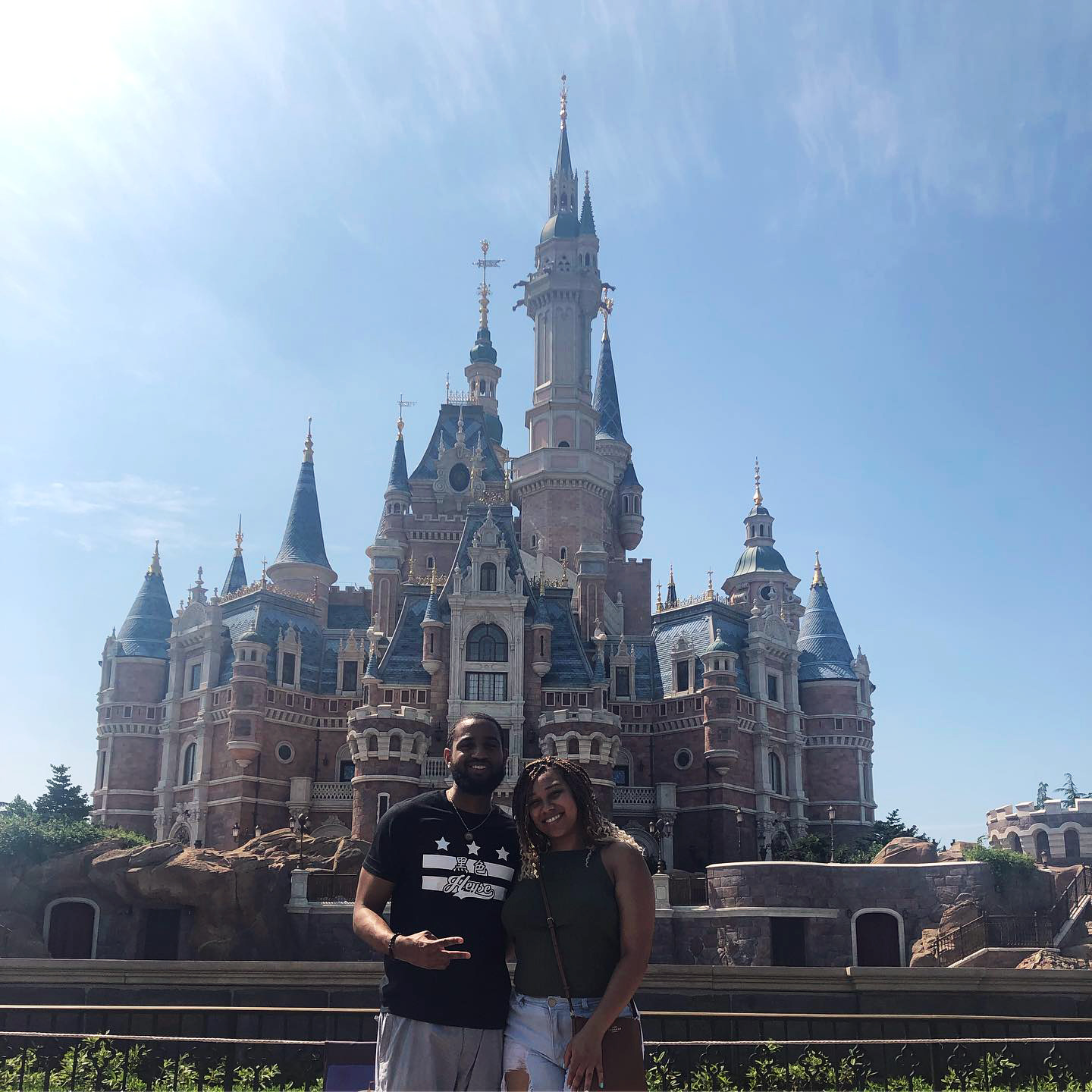 PHOTO: Teacher Brandon Woolfolk is pictured with his girlfriend, Dominique Duarte, at Shanghai Disneyland in China.