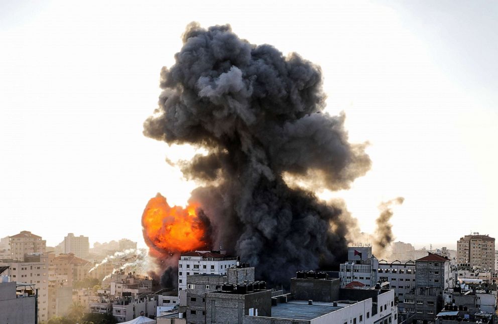 PHOTO: Smoke rises from 14-story building as Israeli fighter jets continue to pound a Palestinian building called "Ash-Shuruq" at Omar Al-Mukhtar neighborhood in the Gaza Strip,  May 12, 2021.