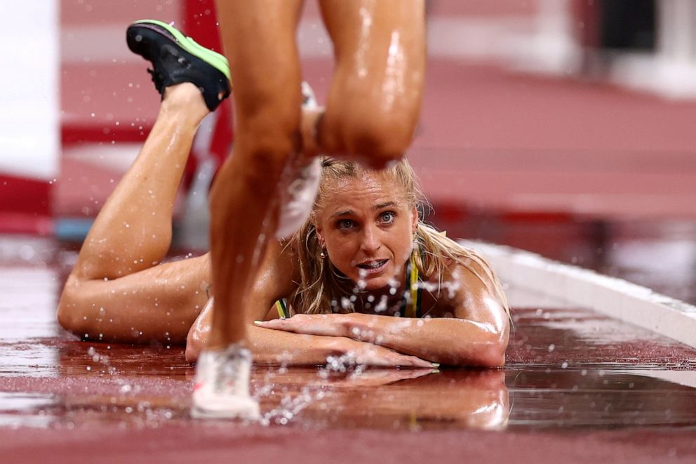 PHOTO: Genevieve Gregson of Australia reacts after falling down during the women's 3000m steeplechase on Aug. 4, 2021, in Tokyo, Japan.
