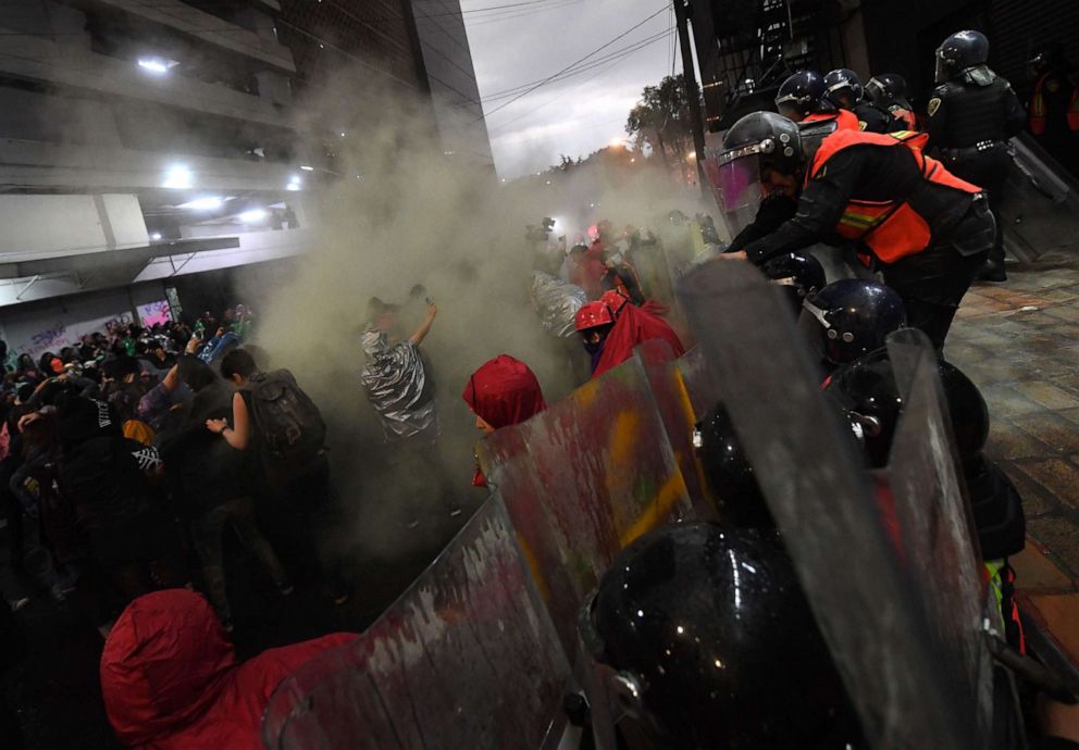 PHOTO: Protesters clash with police as women march in Mexico City, Feb. 14, 2020, to protest gender violence.