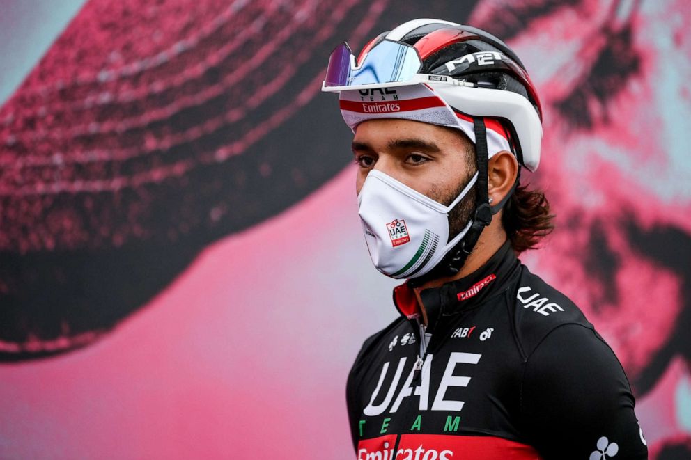 PHOTO: Columbian cyclist Fernando Gaviria wears a face mask to protect against the novel coronavirus as he attends the 13th stage of the Giro d'Italia race, from Cervia to Monselice, Italy, on Oct. 16, 2020.