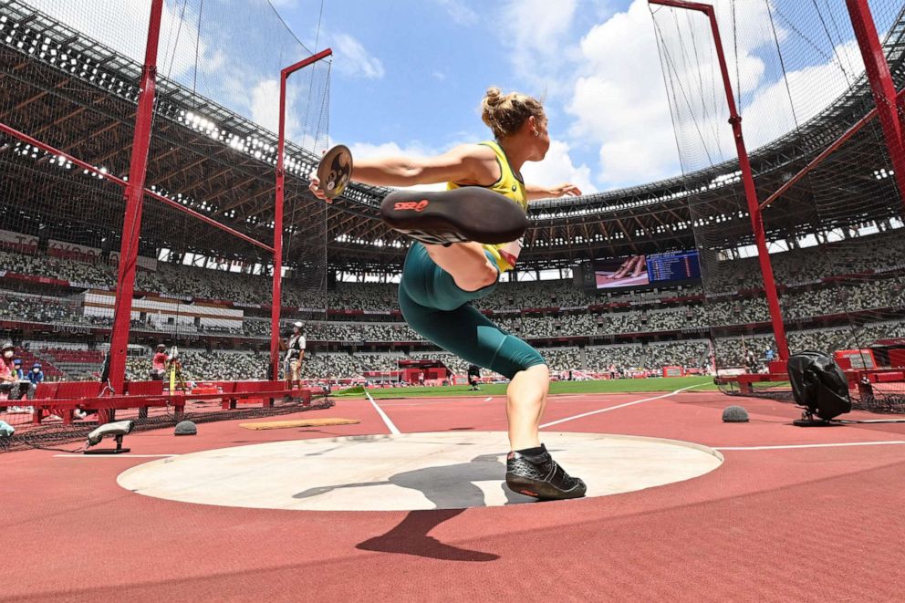 PHOTO: Australia's Dani Stevens competes in the women's discus throw qualification during the Tokyo 2020 Olympic Games at the Olympic Stadium in Tokyo on July 31, 2021.