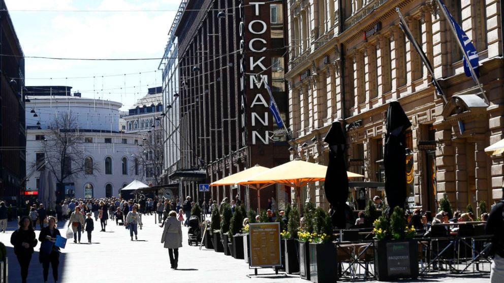 PHOTO: People walk past Stockmann shopping center in Helsinki, Finland, May 6, 2017.