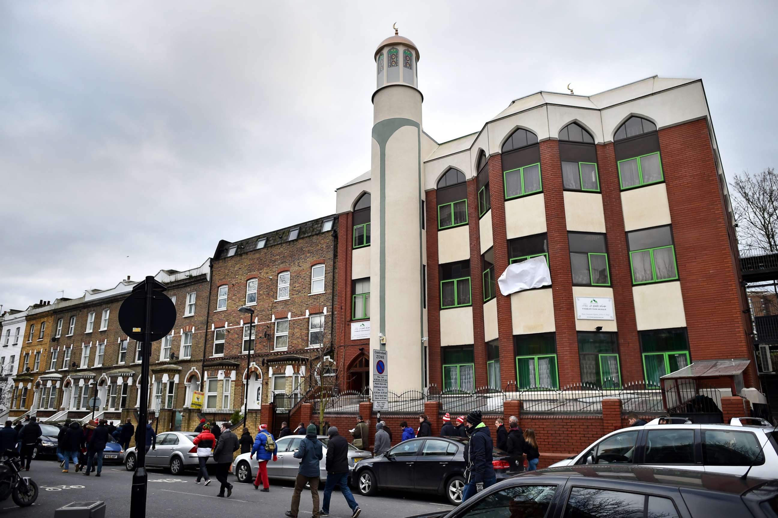PHOTO: People walk past Finsbury Park Mosque during a mosques open day in London, Feb. 1, 2015. 