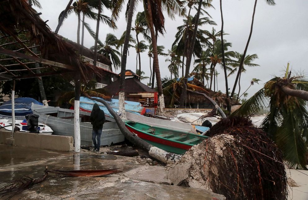 PHOTO: A person walks amidst debris on the seashore in the aftermath of Hurricane Fiona in Punta Cana, Dominican Republic, Sept. 19, 2022.