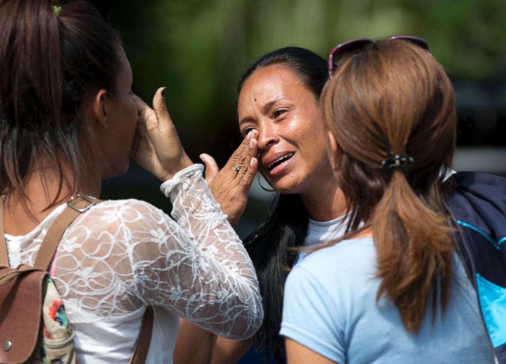 PHOTO: Relatives cry after learning their loved ones died in a fire that swept through a police station, in Valencia, Venezuela, March 29, 2018. 