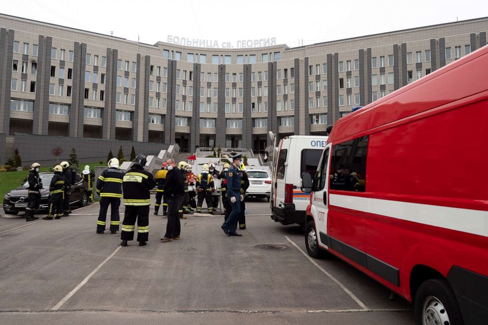 PHOTO: Russian emergency workers attend the scene of a fire at St. George Hospital in Saint Petersburg, Russia, on May 12, 2020. Russian state media reported that the blaze killed five coronavirus patients who had been put on ventilators at the hospital.