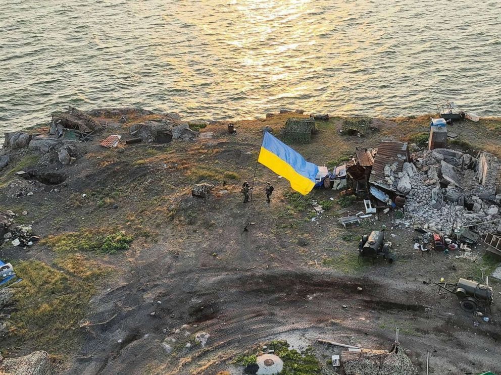 PHOTO: Ukrainian service members install a national flag on Snake (Zmiinyi), Ukraine, July 7, 2022.
