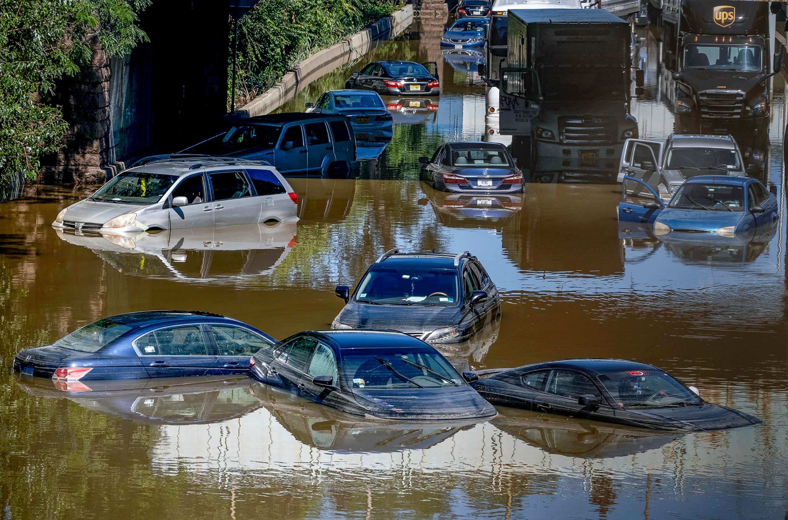 PHOTO: Cars and trucks left stranded in high water on an expressway after flash flooding in New York, from Hurricane Ida, Sept. 2, 2021.