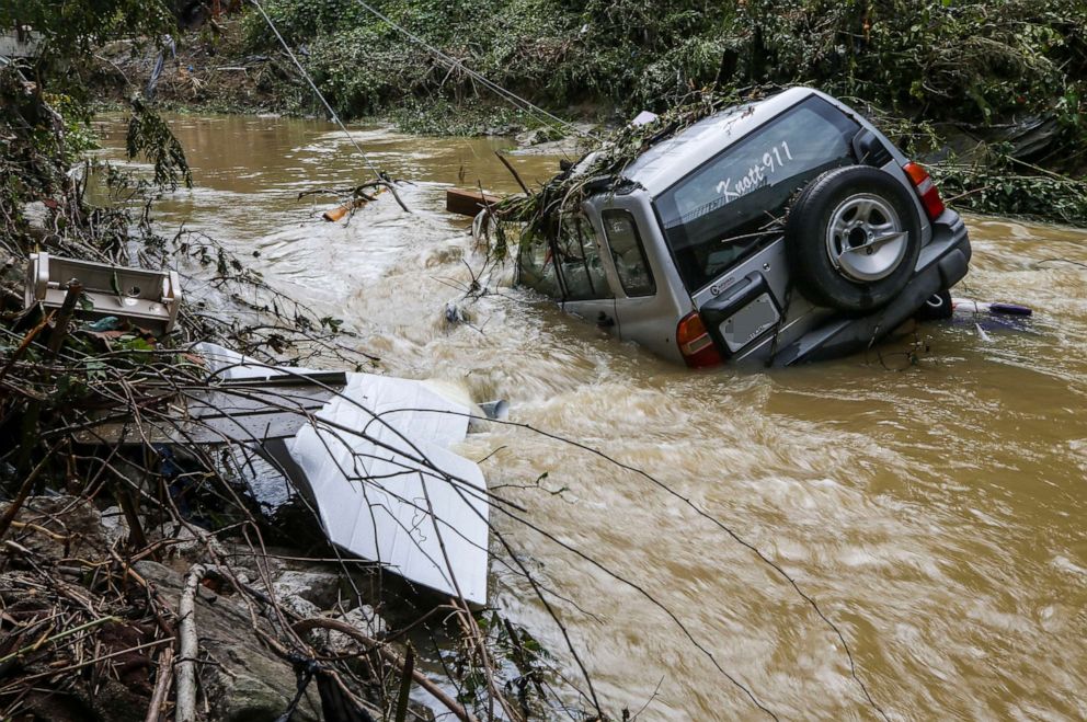 PHOTO: A Knott County 911 emergency vehicle was washed into the Right Fork Troublesome Creek in Hindman, Ky., July 29, 2022.
