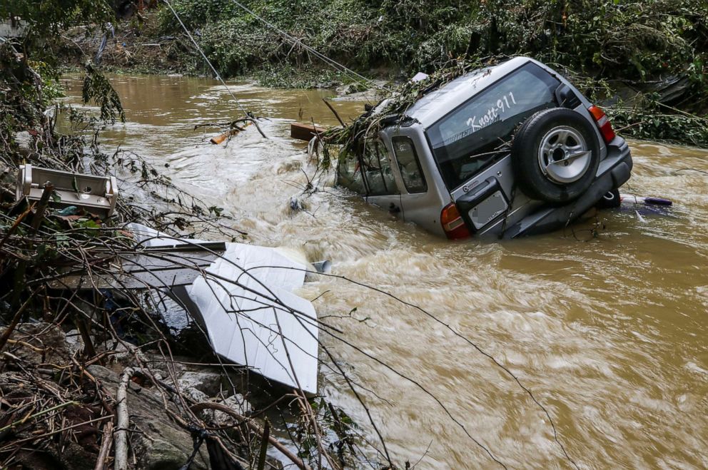 PHOTO: A Knott County 911 emergency vehicle was washed into the Right Fork Troublesome Creek in Hindman, Ky., July 29, 2022.
