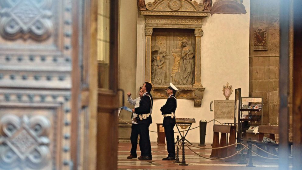 PHOTO: Police stand inside Santa Croce Basilica where a 52-year-old Spanish tourist was killed after being struck by a piece of masonary that fell off the top of a nave, Oct. 19, 2017, in Florence, Italy. 