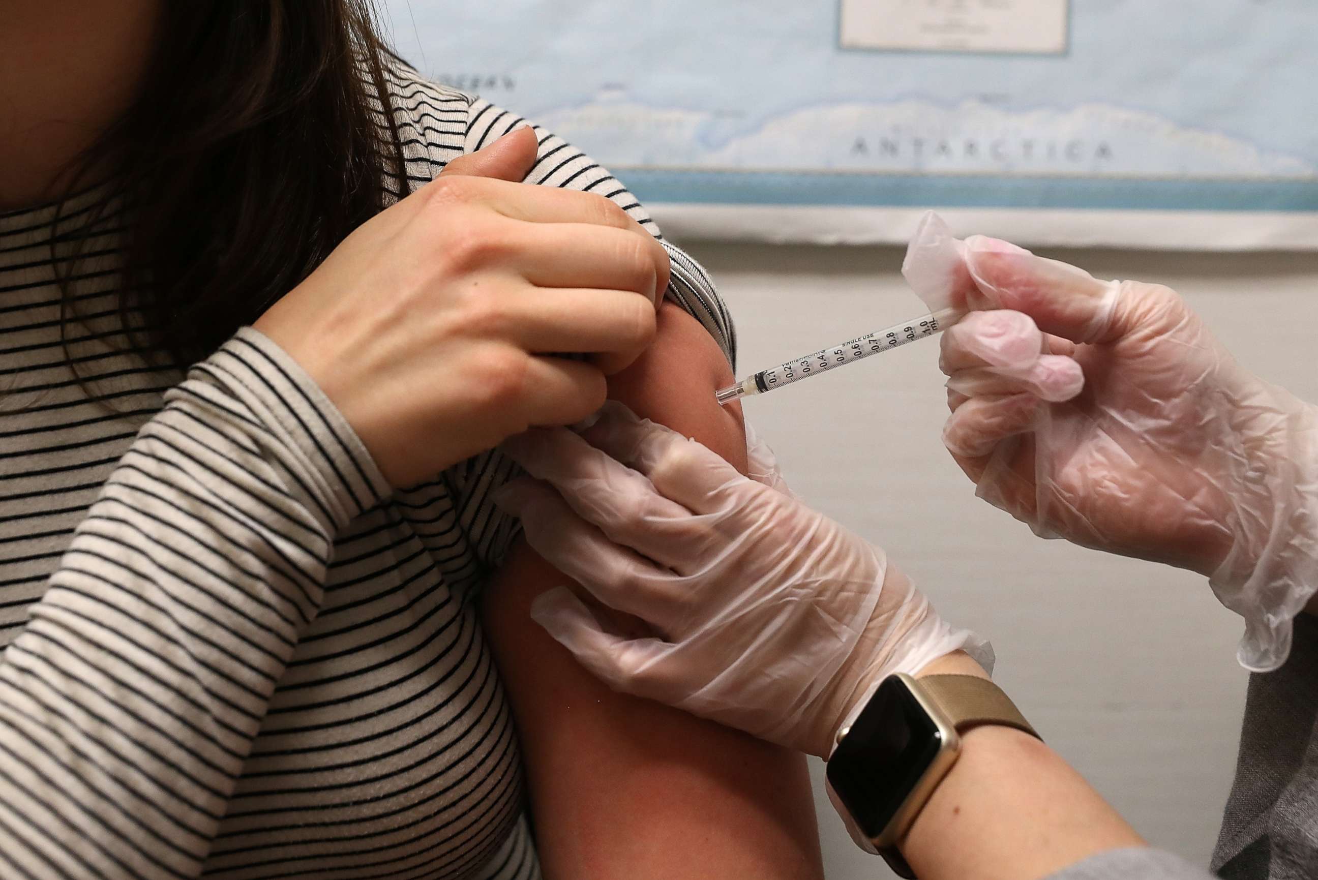 PHOTO: In this Jan. 22, 2018, file photo, a woman receives a flu shot at a Walgreens pharmacy in San Francisco.