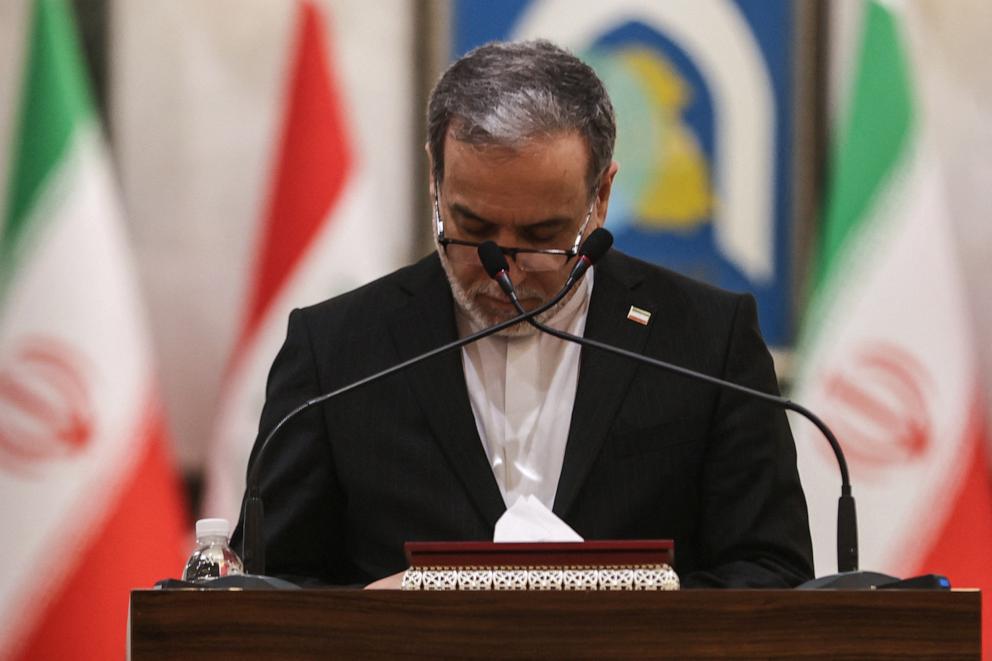 PHOTO: Iranian Foreign Minister Abbas Araghchi looks down at notes during a joint press conference with his Iraqi counterpart during their joint press conference following a meeting in Baghdad on July 28, 2026.